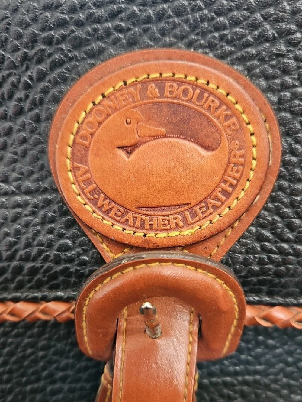 Dooney & Bourke Leather Satchel. All Weather Black with Tan Trim Satchel